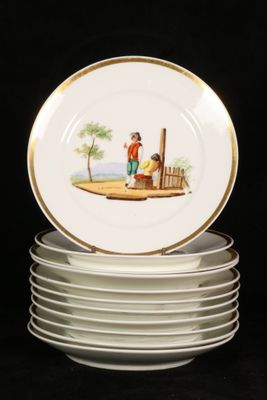 a stack of plates with a picture of a man and a woman on them
