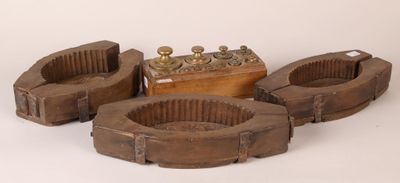 three wooden ashtrays with brass fittings and a wooden box
