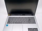 an open laptop computer sitting on top of a white table