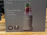 a box of nutribullet on a wooden table