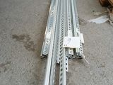 a lot of metal rails that are laying on the ground