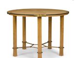 une table ronde en bois avec des pieds cordés et un plateau en verre