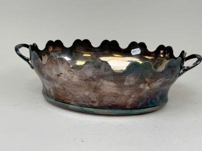 a silver bowl that is sitting on a table