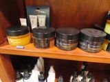 many different types of skin care products on a shelf