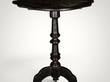 a black table with a wooden top on a white background