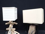 pair of driftwood lamps with a white shade and a wooden base
