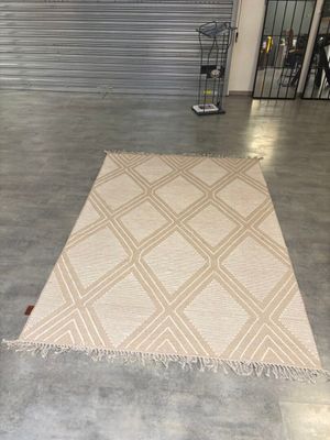 Tapis beige et écru à motifs croisillons COCO MAISON 160 x 2… - Photo 1
