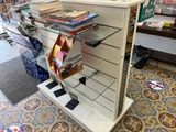 a display case with books and magazines on it