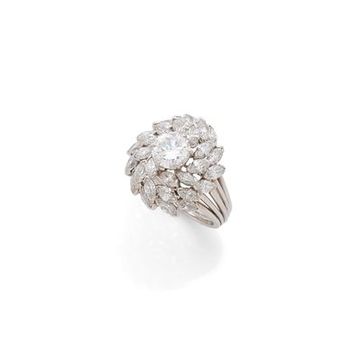 a diamond cluster ring, by van cleef