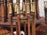 a wooden model of a ship on display on a table