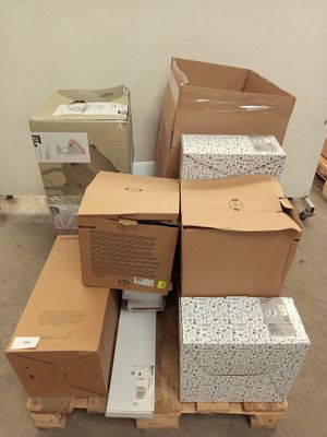 many boxes stacked on top of each other on a pallet