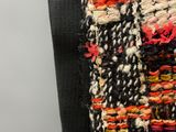 a close up of a multicolored scarf on a mannequin mannequin mannequin mannequin mannequin mannequin mann