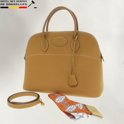 beige leather handbag with matching belt and matching purse strap
