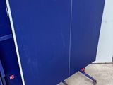 a blue wall with a blue door and a blue wall with a blue door and a blue wall with a blue door and a blue wall with a blue