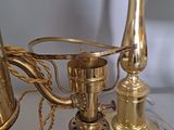 a lamp that is sitting on a table next to a lamp