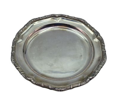 an antique silver plate on a white background with a white background
