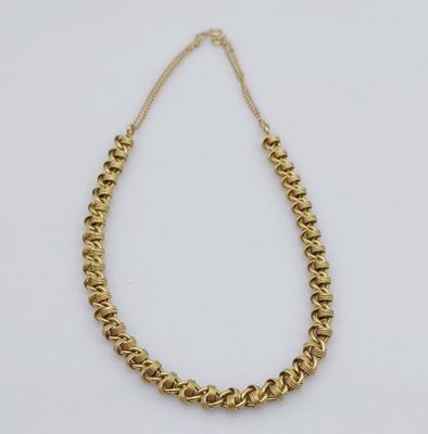 a gold chain necklace with a gold clasp on a white background