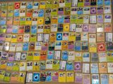 many different types of pokemon cards on the table