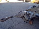an image of a tow truck with a tow bar attached to it