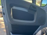 the door of a vehicle with the driver ' s side door open and the driver ' s side door open