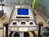 a close up view of a tread machine in a gym