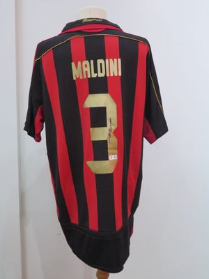 a black and red soccer jersey with a number 3 on it
