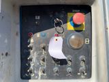 a close up of a control panel with a paper on it