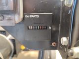 a close up of a clock on a car ' s dashboard