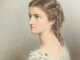 portrait of a young woman in a white dress with braids