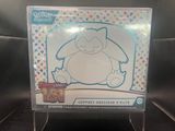 a close up of a pokemon trading card on display in a store