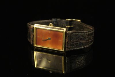 S.T DUPONT. Montre bracelet d'homme à boîtier rectangulaire …
