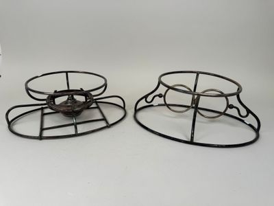 pair of vintage wrought iron trays with a bird on them