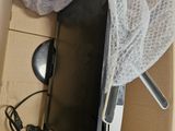 a person that is opening a box with a laptop in it