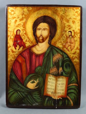 un tableau représentant Jésus tenant un livre et un oiseau