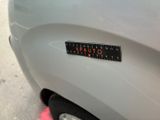 a close up of a sticker on the back of a car
