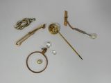 a lot of different items that are laying out on the table