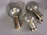 three light bulbs that are sitting on a table