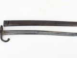 pair of old and worn swords on a white surface with a white background