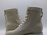 the boots are made of sued and have a rubber sole