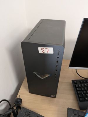 a desktop computer sitting on top of a desk next to a keyboard and mouse