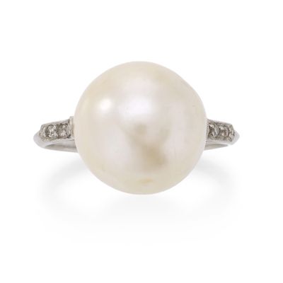 a white pearl and diamond ring
