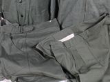 a pair of pants and a jacket sitting on a table