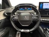 the interior of a car with a steering wheel and dashboard controls