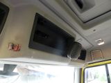 a view of the inside of a bus from the driver ' s seat