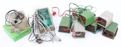 many electronic devices that are sitting on a white surface