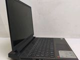 a close up of a laptop computer sitting on top of a table