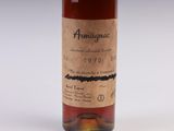 an image of a bottle of wine on a white surface