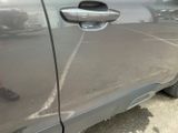 a close up of a car ' s door handle and door handle