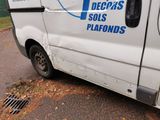 a van that is parked on the side of the road