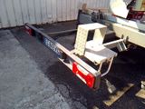 a picture of a trailer with a ladder attached to it